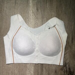 White lace corset top with buttons and orange trim. Size: L